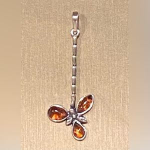 Silver and amber pendant